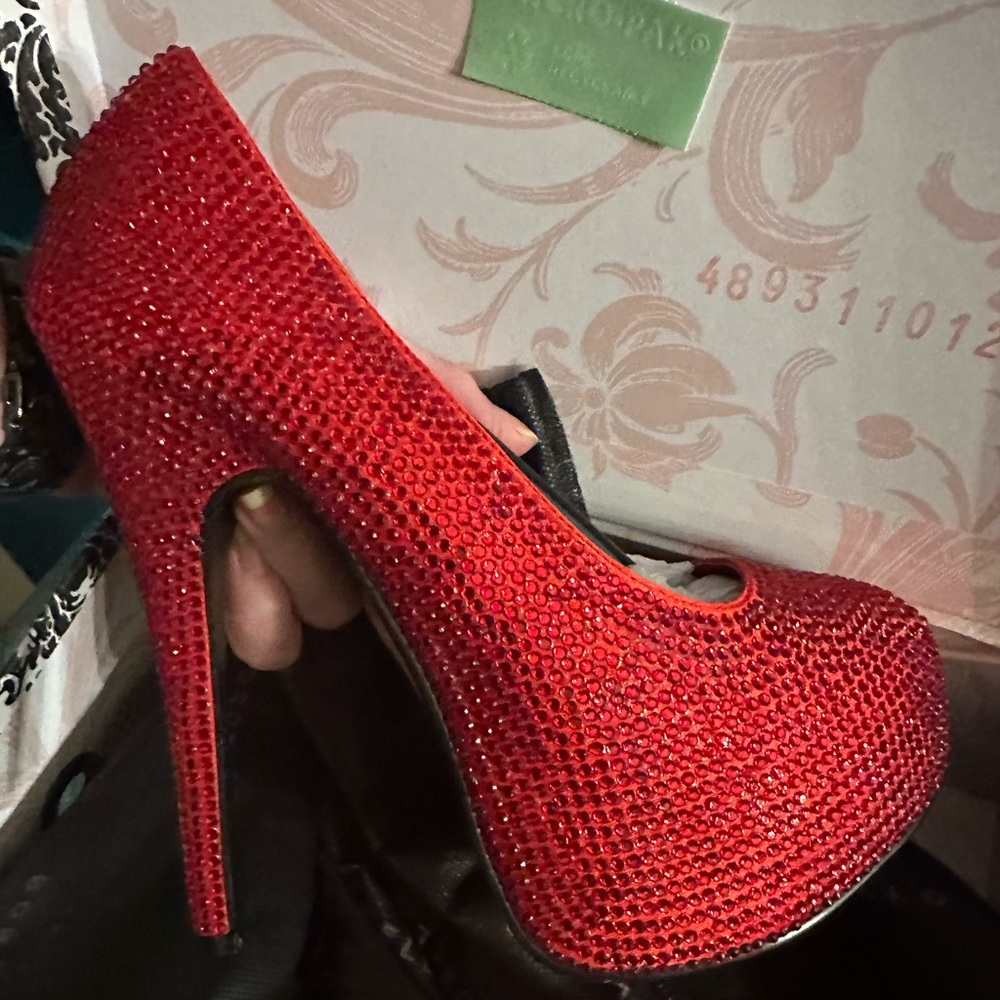 Red sequined high heels